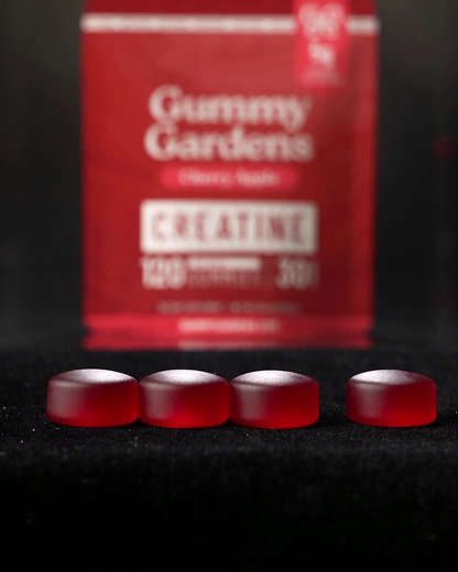 Serving photo: Cherry Apple, one serving is 4 gummies (5g creatine) in front of the pouch